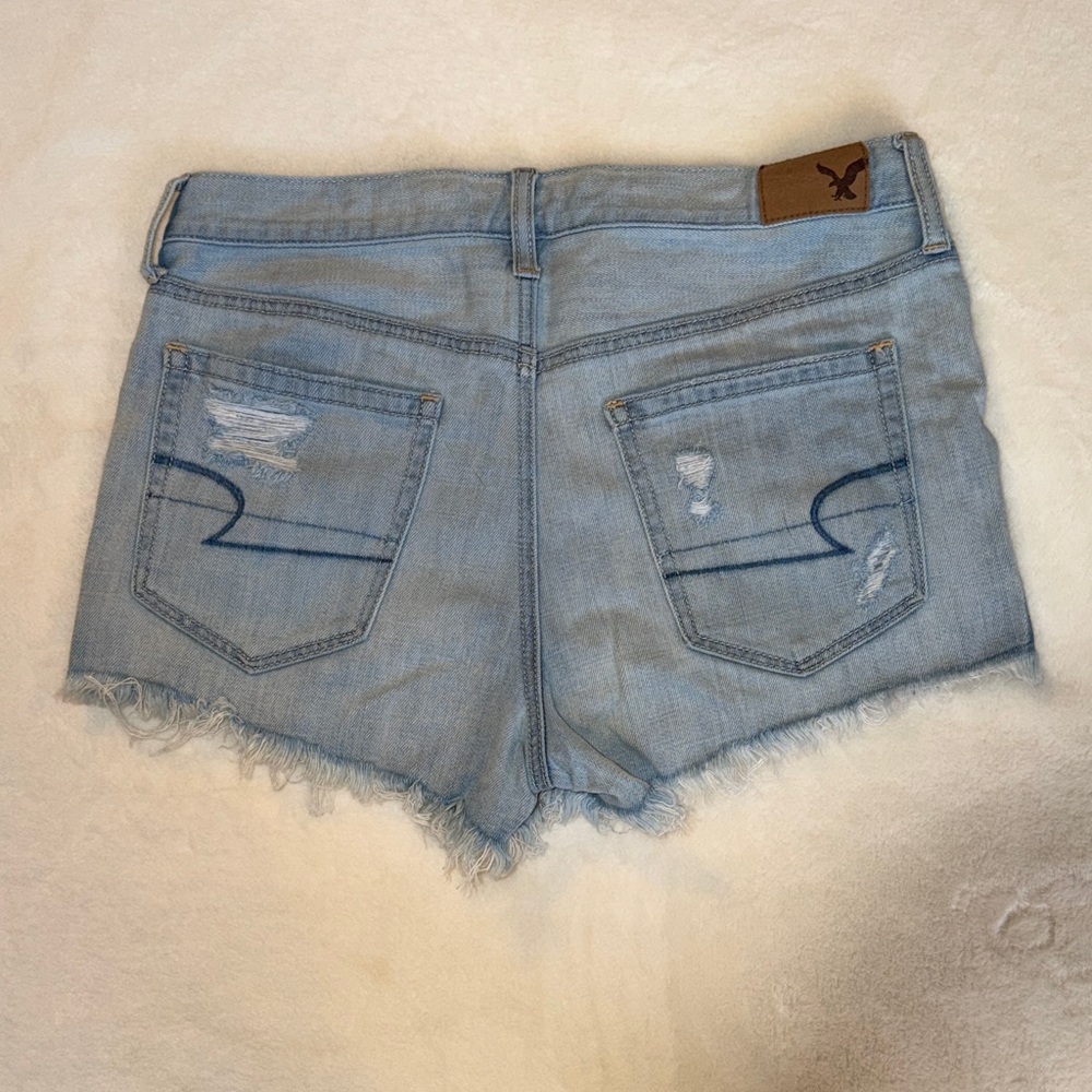 American Eagle Outfitters Light Blue Ripped Jean Shorts - Picture 2 of 7
